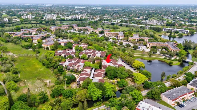 an aerial view of house with yard