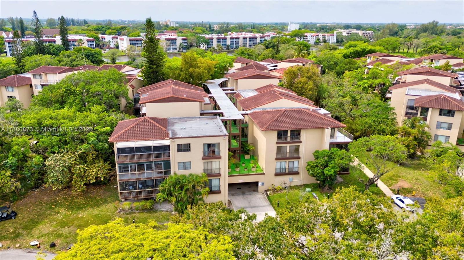 6010 South Falls Cir Drive, Unit 419 Lauderhill, FL 33319 - Photo 42 of 45 an aerial view of multiple houses with yard