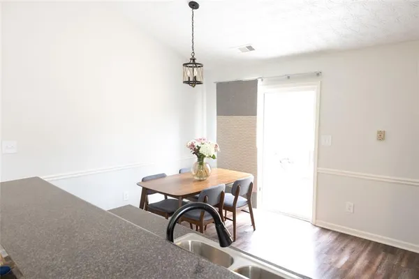 a workspace with furniture and wooden floor