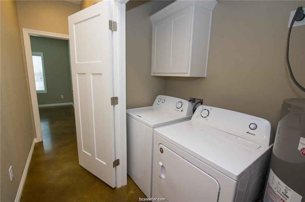 3200 Link Street Bryan, TX 77801 - Photo 11 of 24 a utility room with dryer and washer