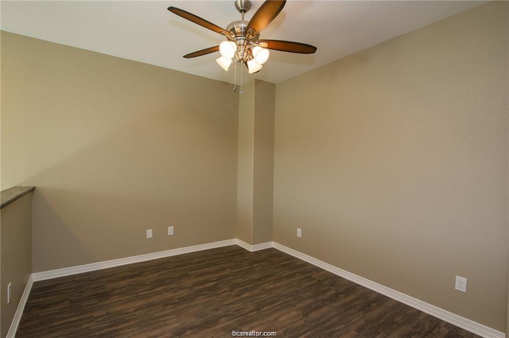 3200 Link Street Bryan, TX 77801 - Photo 14 of 24 a view of an empty room with wooden floor