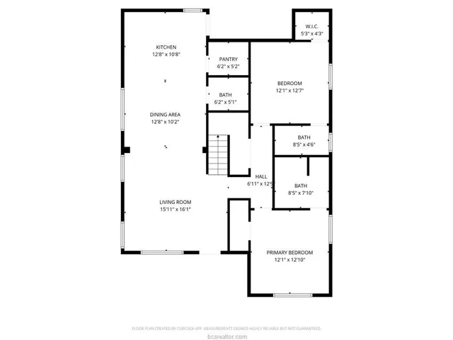 a picture of a bench in front of a wall