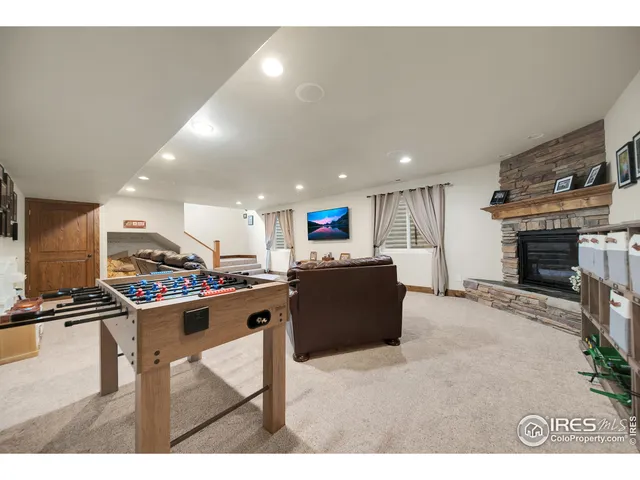 a room with furniture and a fireplace