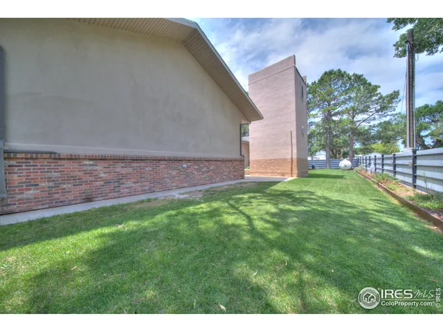 a view of a backyard with a garden