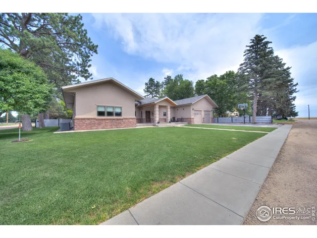 a house view with a garden space