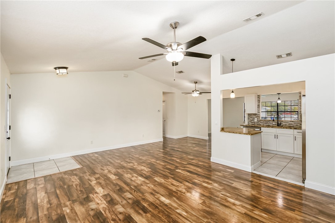 1121 Clearmont Street Sebastian, FL 32958 - Photo 11 of 31 a view of a kitchen with a sink and a stove top oven