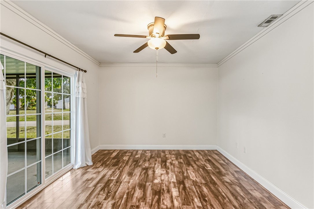 1121 Clearmont Street Sebastian, FL 32958 - Photo 18 of 31 an empty room with windows