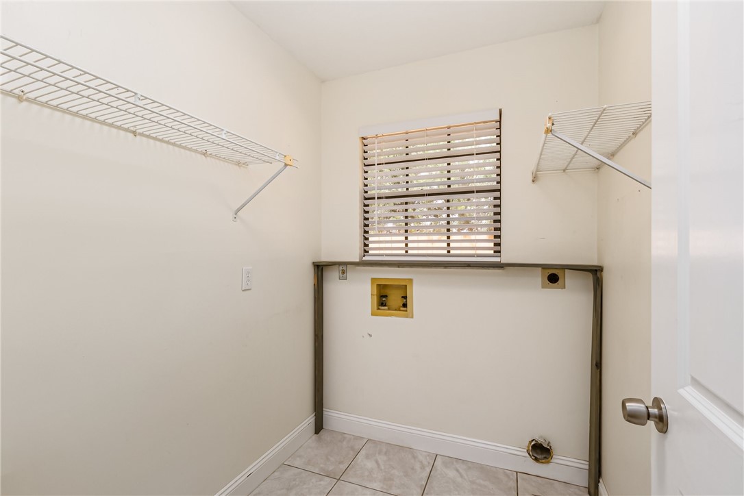 1121 Clearmont Street Sebastian, FL 32958 - Photo 25 of 31 a view of a door and a window