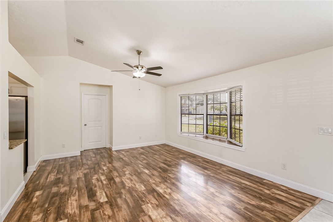 1121 Clearmont Street Sebastian, FL 32958 - Photo 8 of 31 a view of an empty room with a window