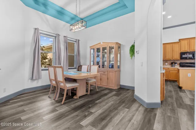 a view of a dining room with furniture