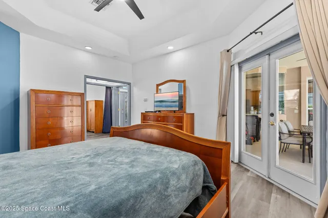 a bathroom with a sink vanity mirror and toilet