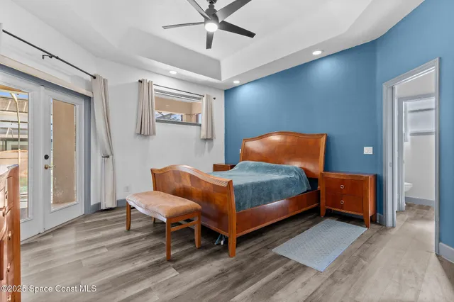 a kitchen with kitchen island granite countertop a sink stainless steel appliances and cabinets