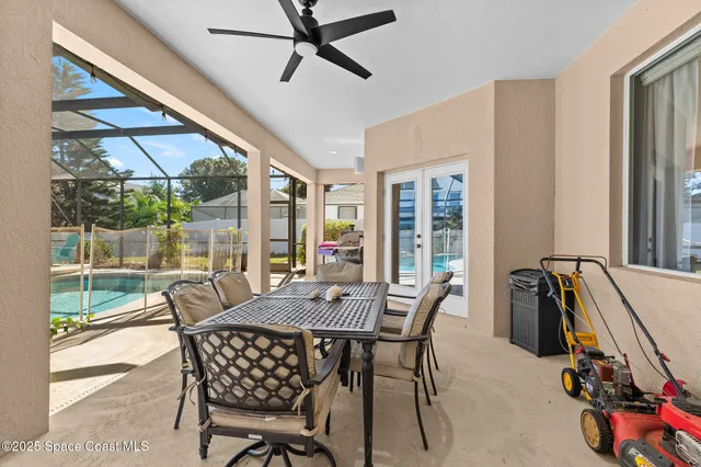 a view of a swimming pool with a patio