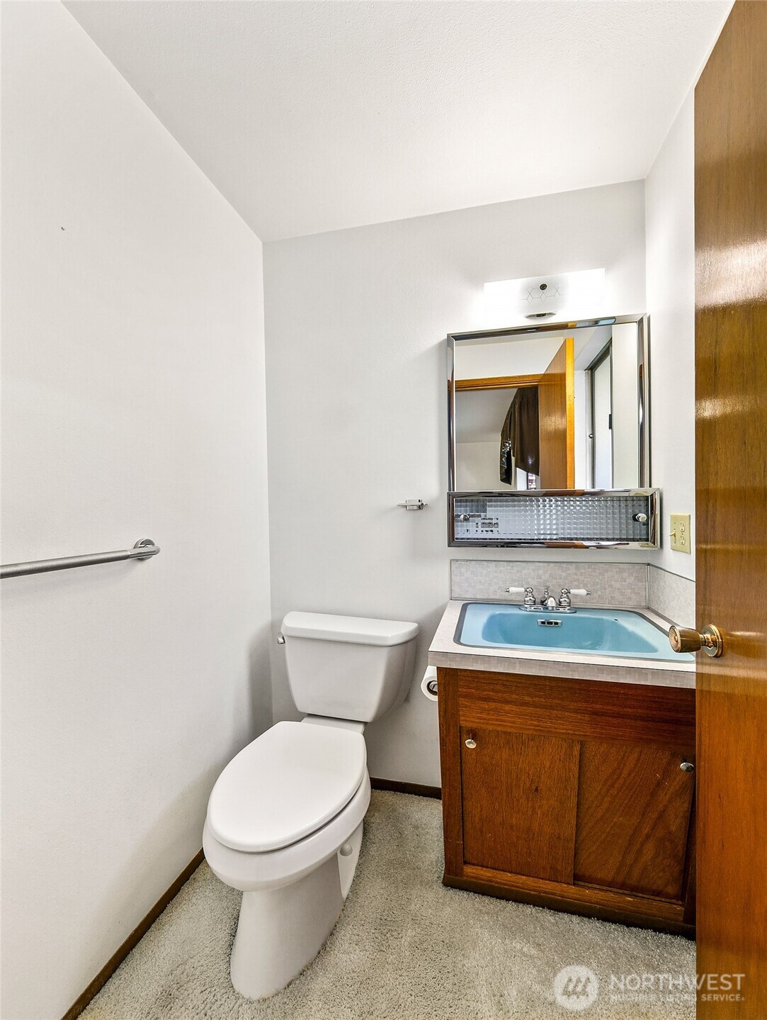 2624 Southwest 172nd Street Burien, WA 98166 - Photo 11 of 30 a bathroom with a sink toilet and mirror