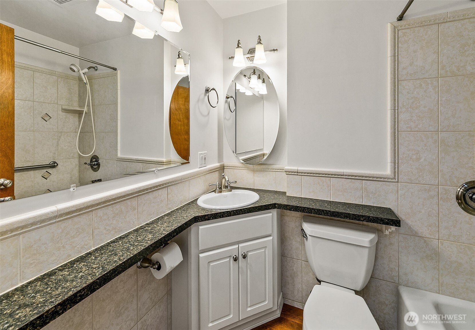 2624 Southwest 172nd Street Burien, WA 98166 - Photo 13 of 30 a bathroom with a granite countertop sink mirror and toilet