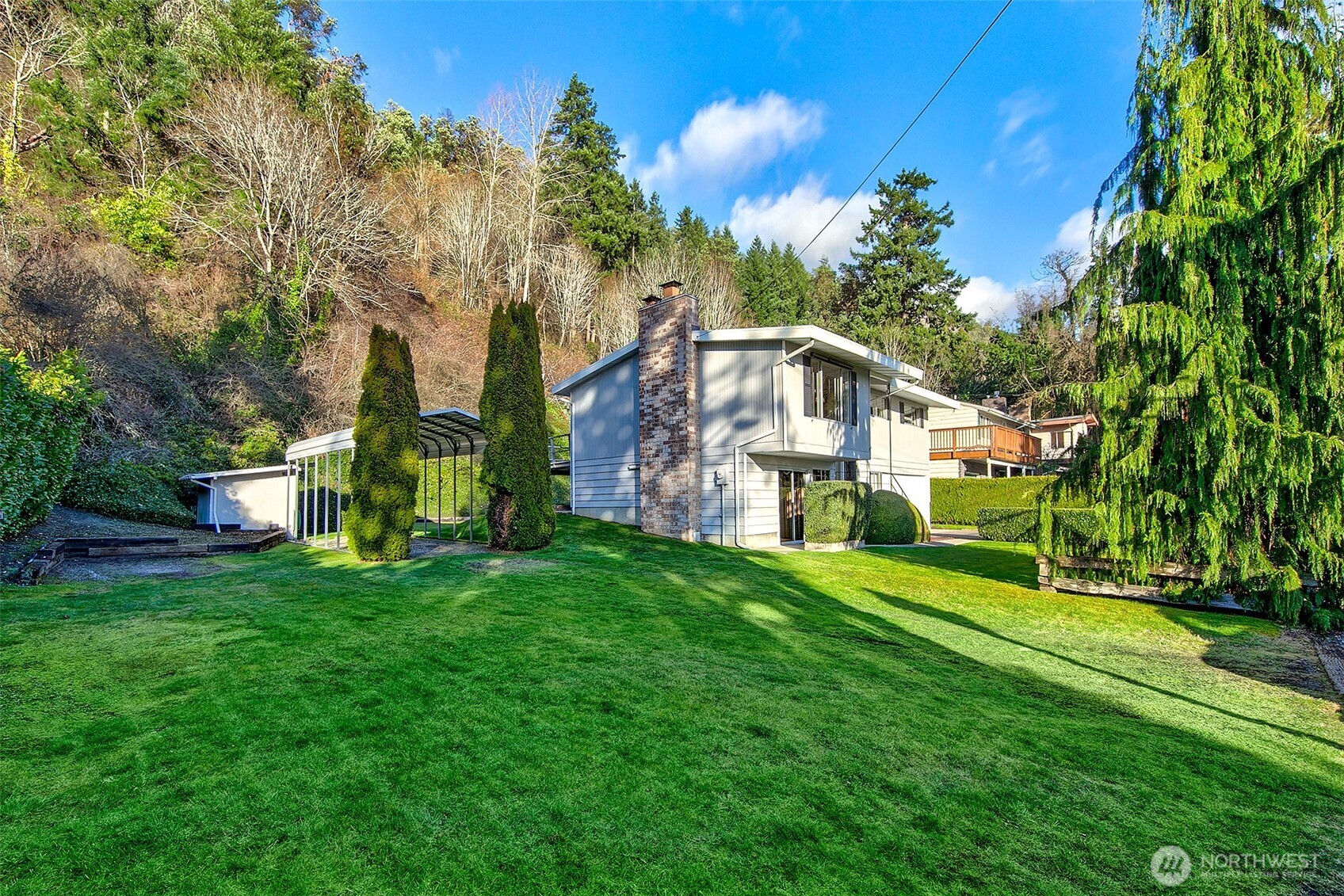 2624 Southwest 172nd Street Burien, WA 98166 - Photo 2 of 30 a view of a house with a big yard