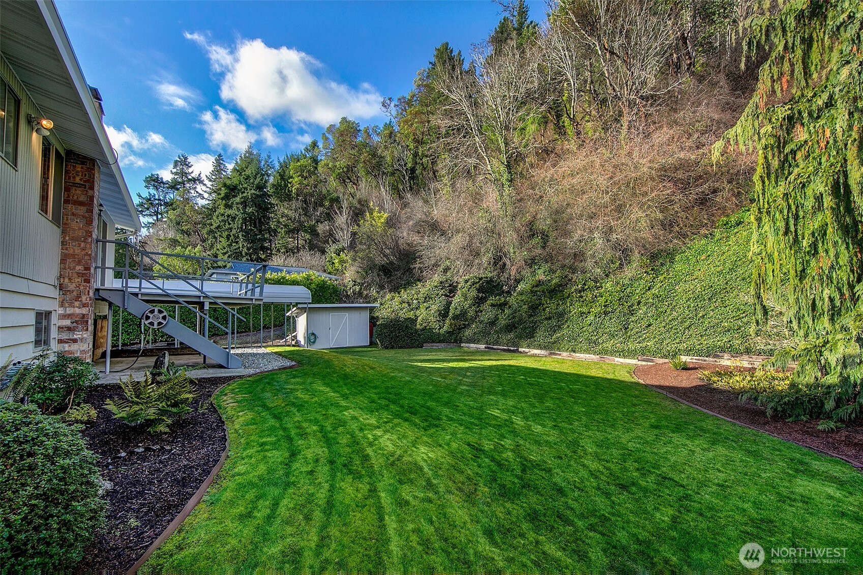 2624 Southwest 172nd Street Burien, WA 98166 - Photo 25 of 30 a view of a house with a yard