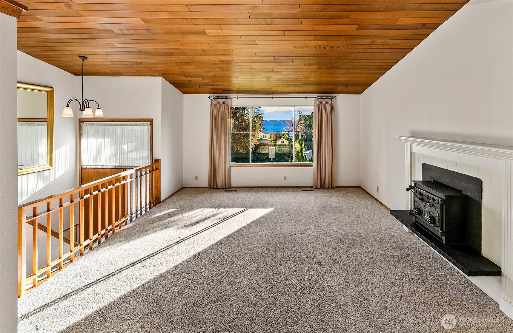 2624 Southwest 172nd Street Burien, WA 98166 - Photo 6 of 30 a view of a porch with wooden floor and fireplace