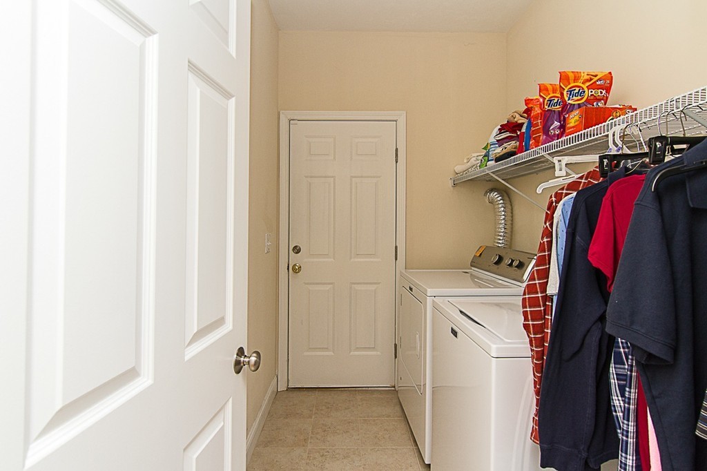 19 Geordan Avenue Bellingham, MA 02019 - Photo 21 of 22 a view of walk in closet with clothes and shoes