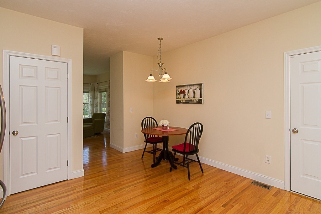 19 Geordan Avenue Bellingham, MA 02019 - Photo 7 of 22 a workspace with furniture and wooden floor