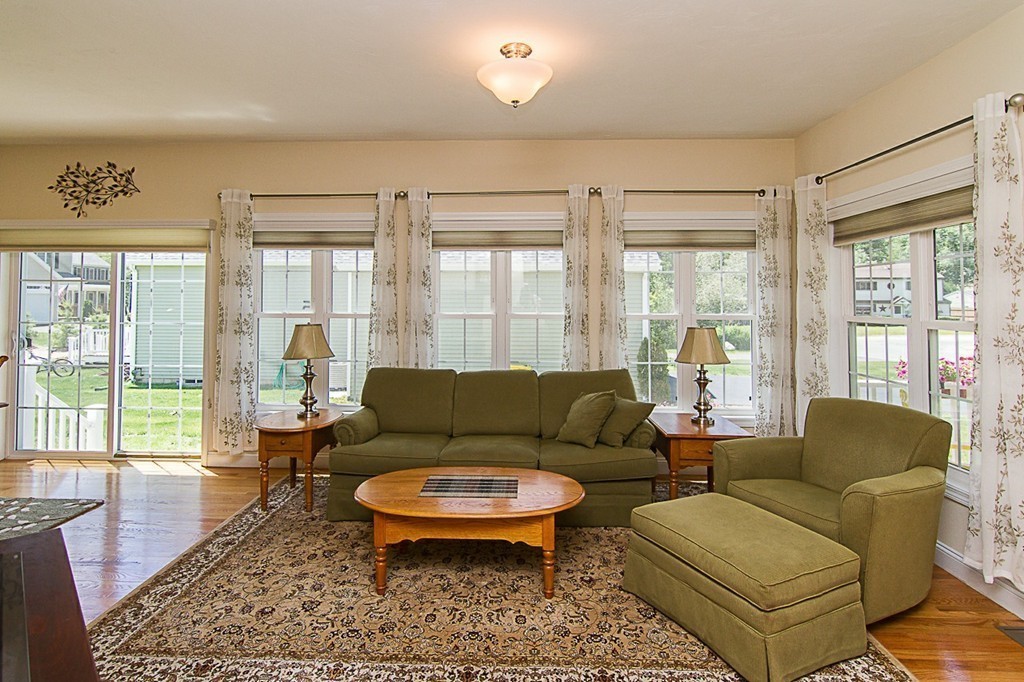 19 Geordan Avenue Bellingham, MA 02019 - Photo 9 of 22 a living room with furniture and a large window