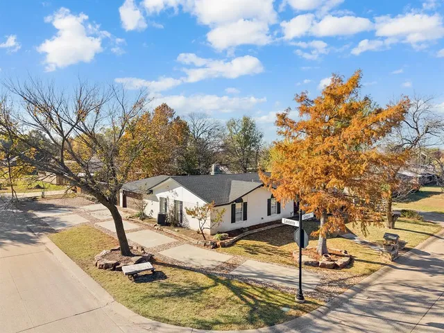 an aerial view of residential building with parking space