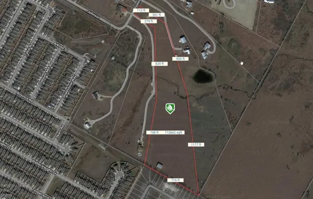 a bathroom with a shower and mirror