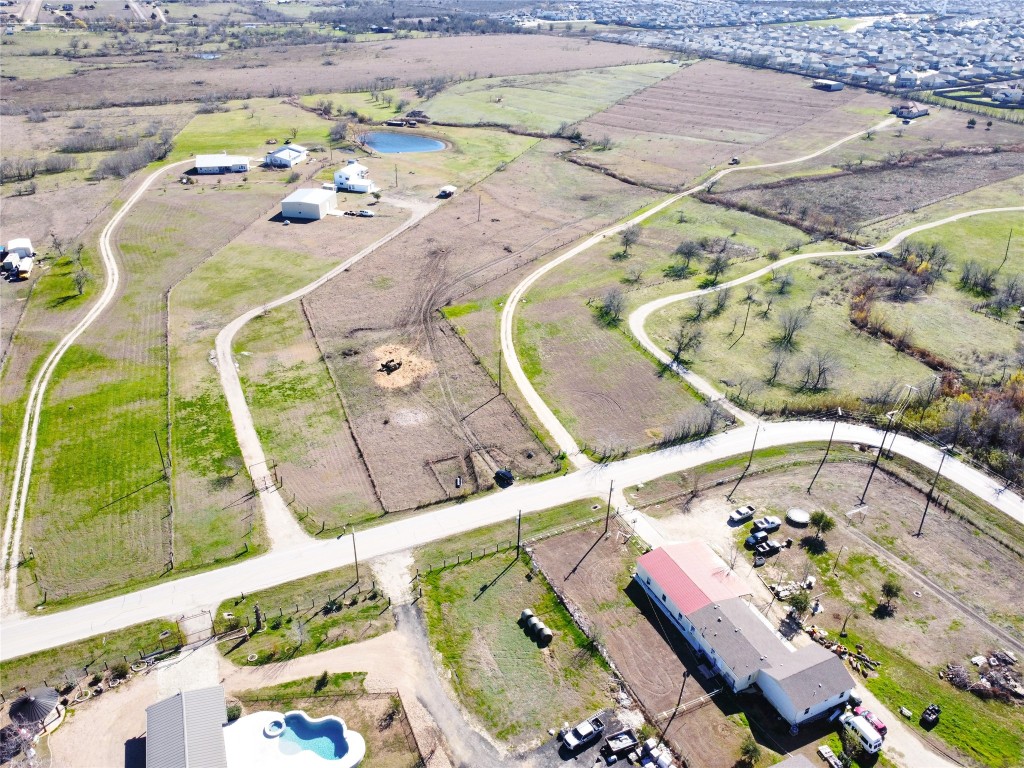 12321 Johnson Road Manor, TX 78653 - Photo 11 of 32 an aerial view of a swimming pool