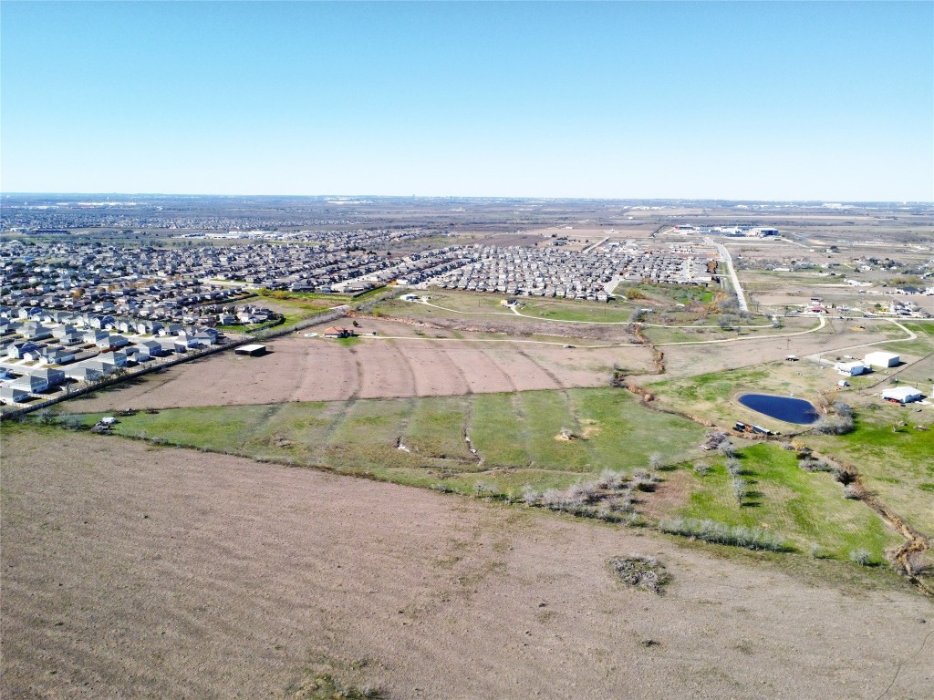 12321 Johnson Road Manor, TX 78653 - Photo 13 of 32 an aerial view of a house with a outdoor space