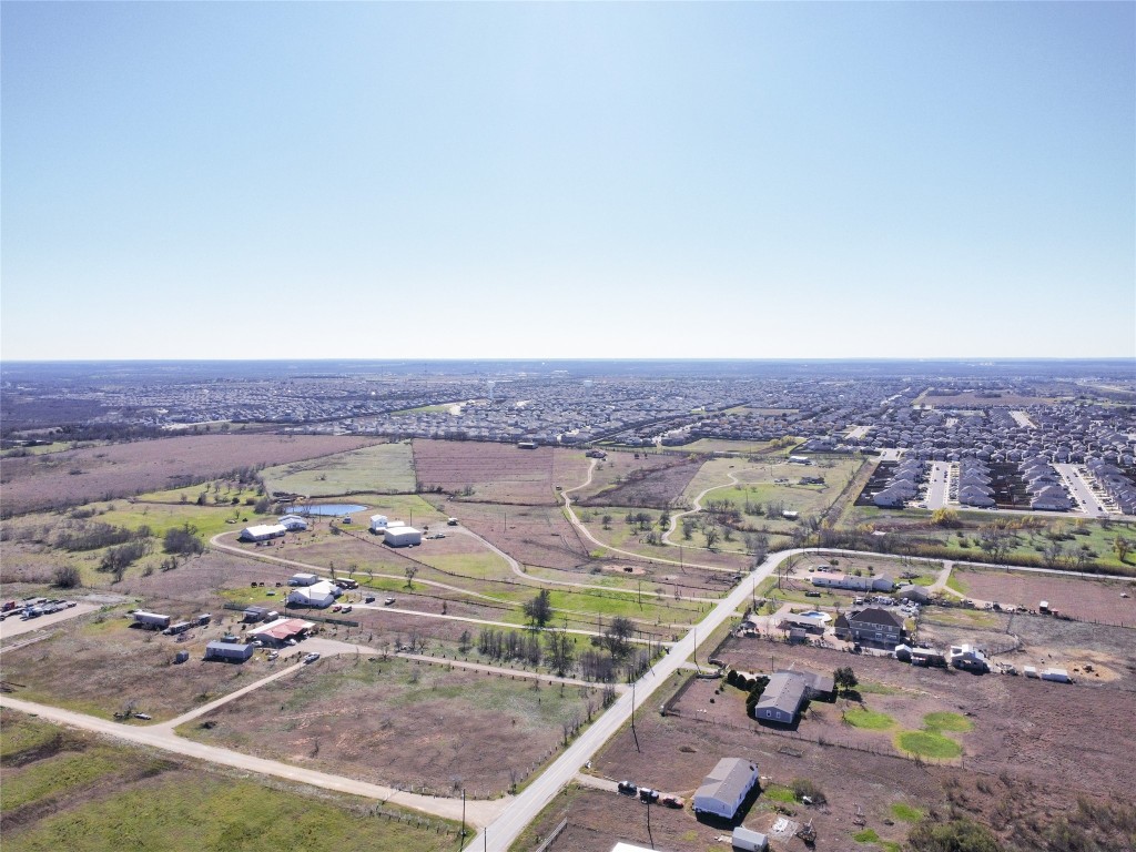 12321 Johnson Road Manor, TX 78653 - Photo 15 of 32 an aerial view of a city