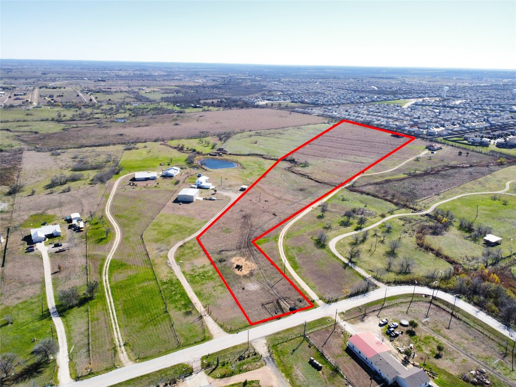 12321 Johnson Road Manor, TX 78653 - Photo 6 of 32 an aerial view of a swimming pool and outdoor space