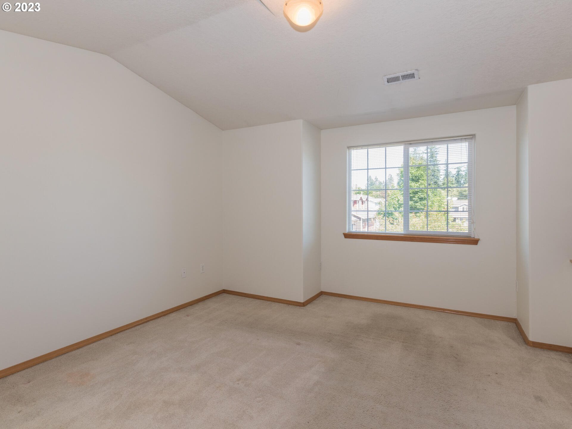 1058 Southwest Ivory Loop Gresham, OR 97080 - Photo 22 of 31 an empty room with windows