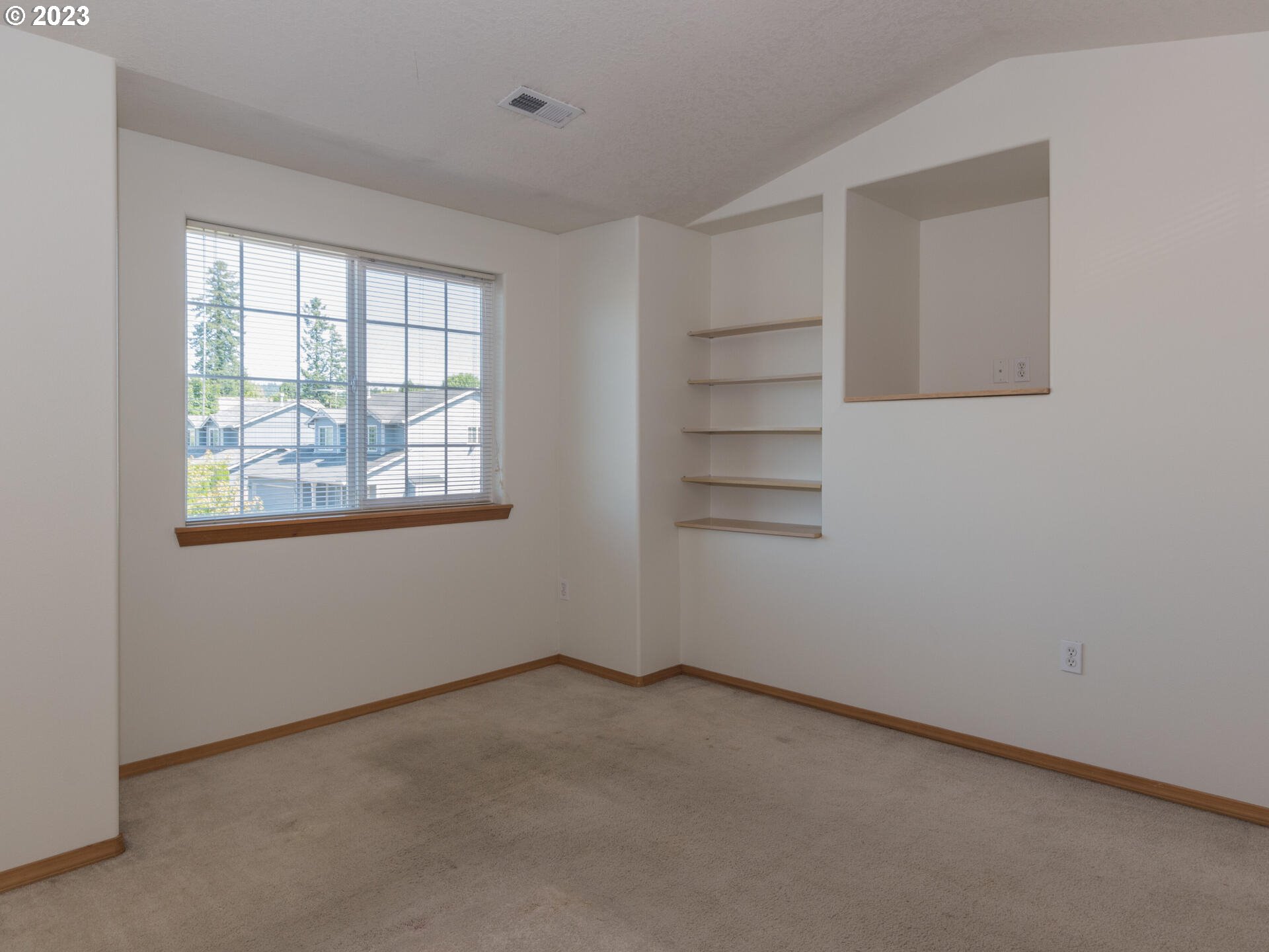 1058 Southwest Ivory Loop Gresham, OR 97080 - Photo 27 of 31 an empty room with windows