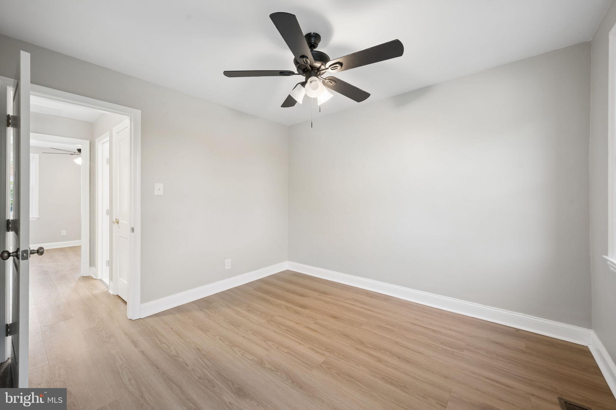3548 Benzinger Road Baltimore, MD 21229 - Photo 22 of 40 wooden floor in an empty room
