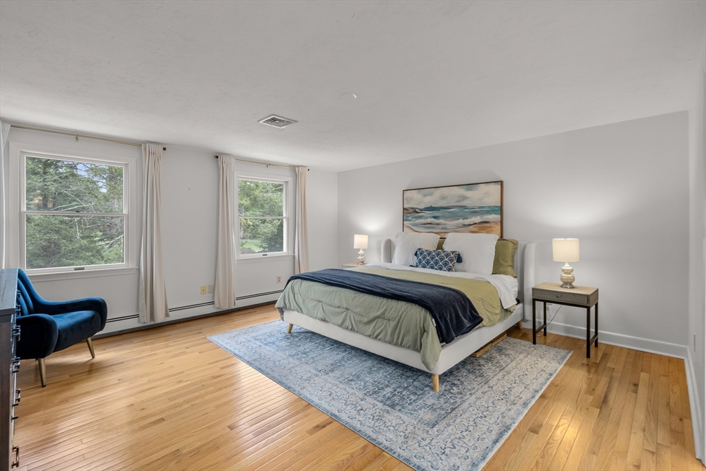 322 Concord Road Wayland, MA 01778 - Photo 16 of 35 a bedroom with a bed and window