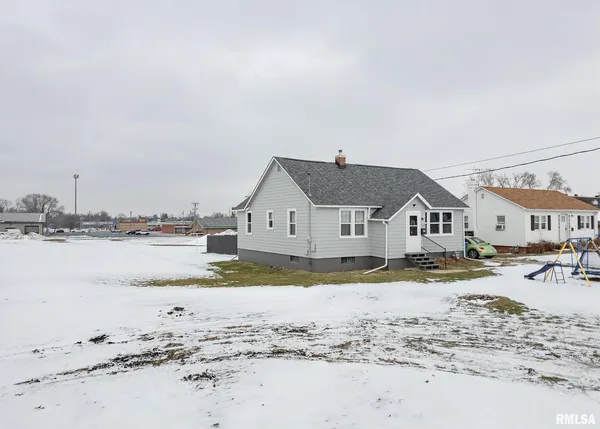 a view of a house with a ocean beach