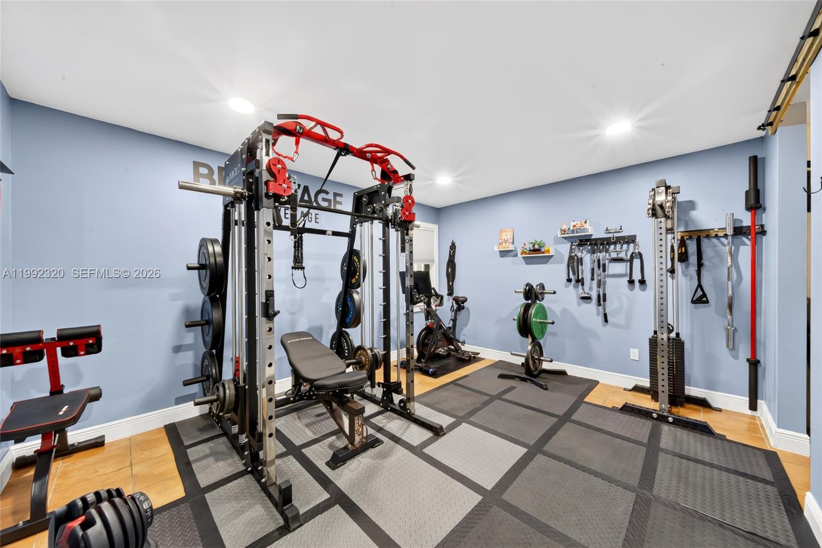 10861 Southwest 132nd Cir Court Miami, FL 33186 - Photo 20 of 42 a view of a room with gym equipment