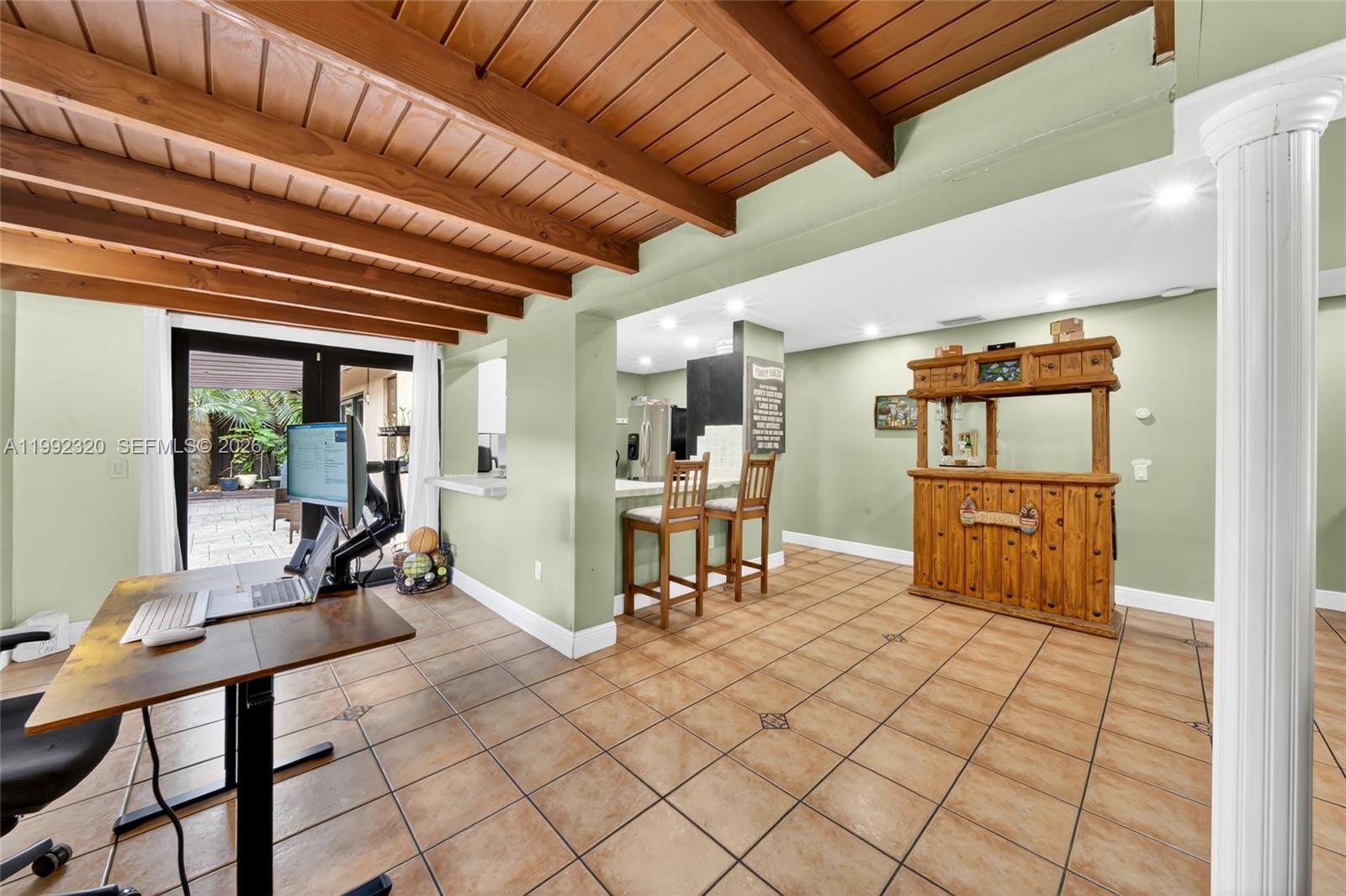 10861 Southwest 132nd Cir Court Miami, FL 33186 - Photo 24 of 42 a room with gym equipment and a large window