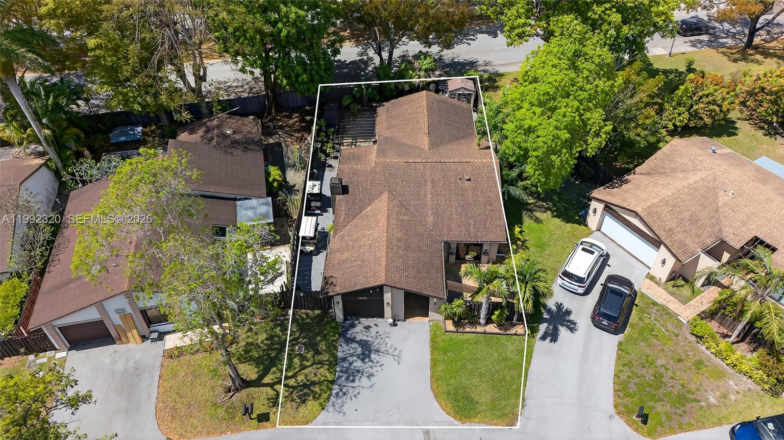10861 Southwest 132nd Cir Court Miami, FL 33186 - Photo 3 of 42 an aerial view of a house with outdoor space swimming pool