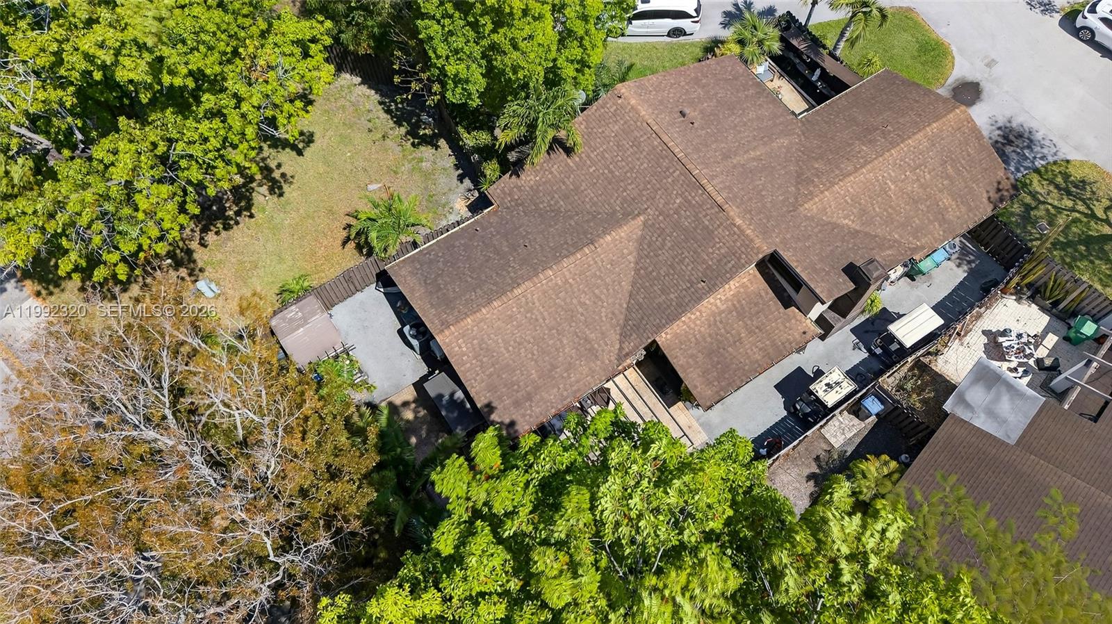 10861 Southwest 132nd Cir Court Miami, FL 33186 - Photo 5 of 42 an aerial view of a house with garden space and street view