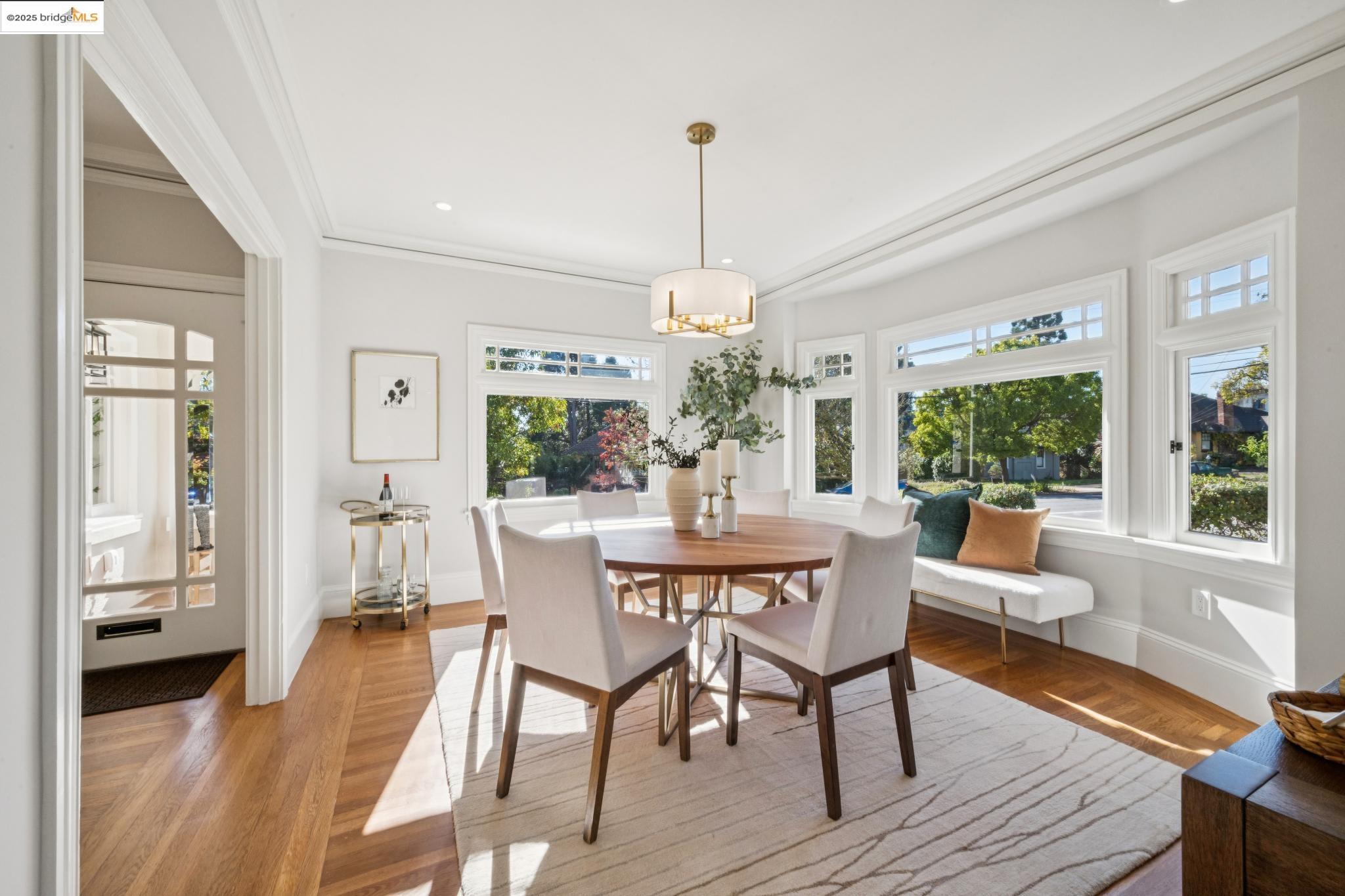 1833 Sonoma Avenue Berkeley, CA 94707 - Photo 14 of 57 a view of a dining room with furniture window and wooden floor