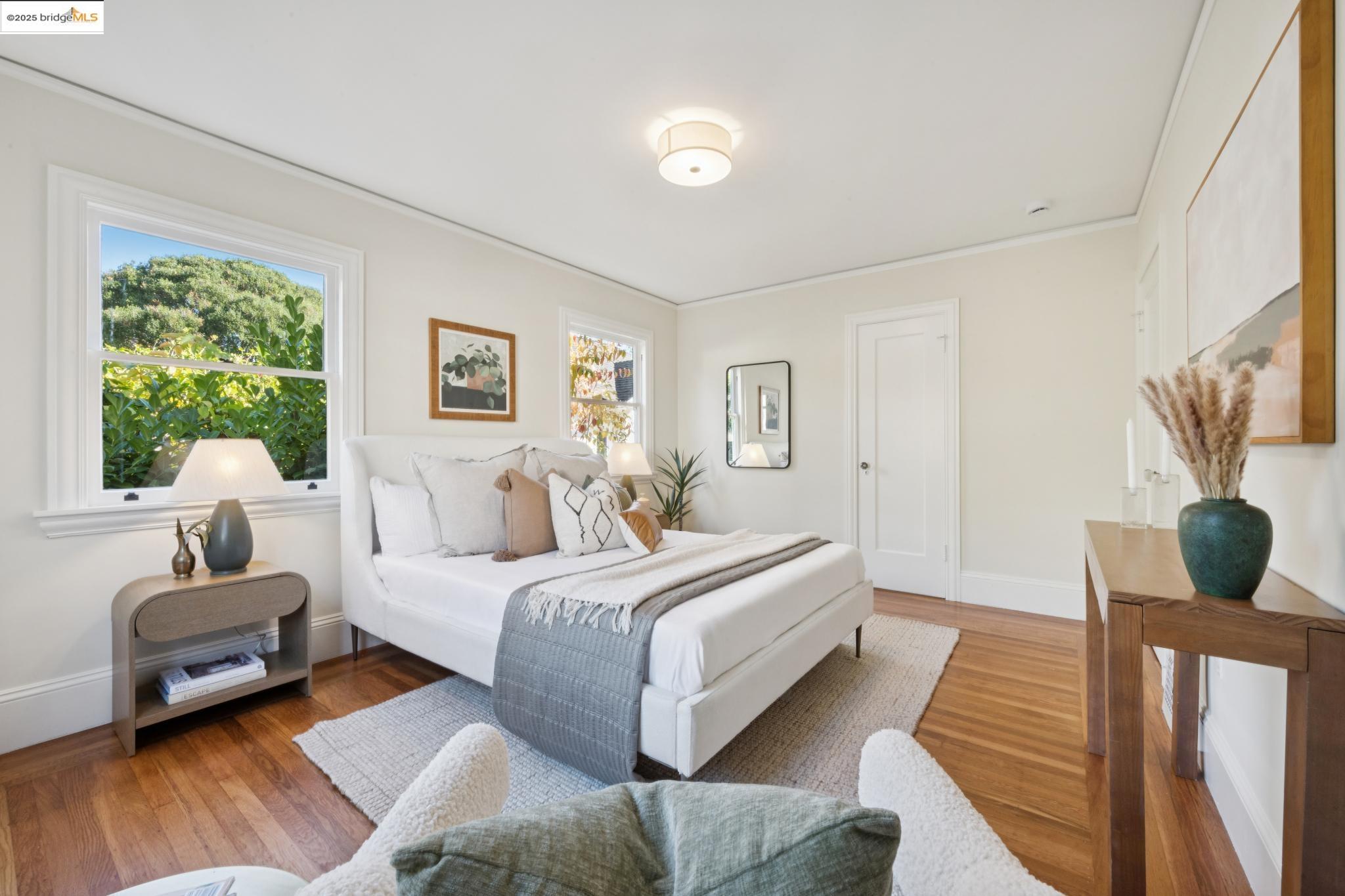 1833 Sonoma Avenue Berkeley, CA 94707 - Photo 25 of 57 a bedroom with a bed couch and a window