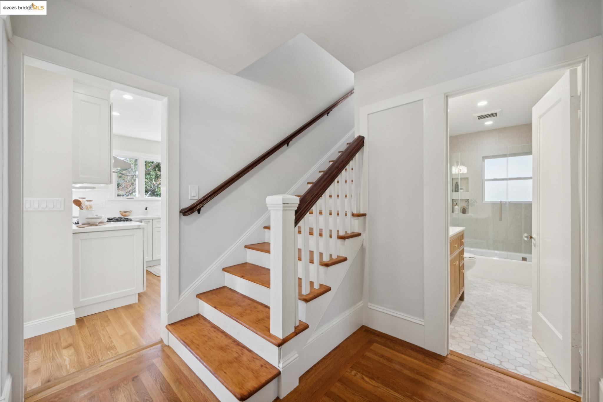 1833 Sonoma Avenue Berkeley, CA 94707 - Photo 26 of 57 a view of entryway with wooden floor and stairs