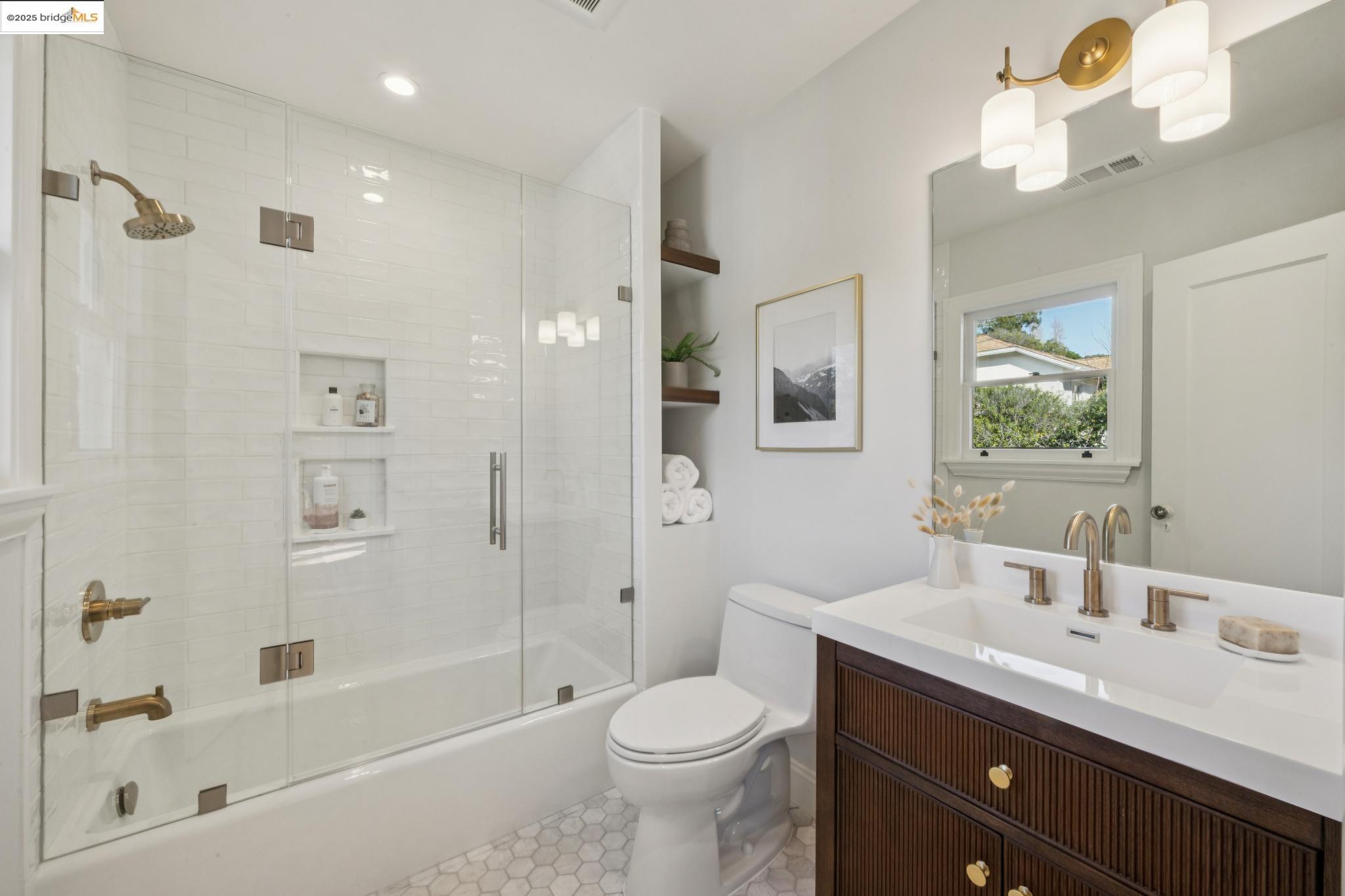 1833 Sonoma Avenue Berkeley, CA 94707 - Photo 34 of 57 a bathroom with a granite countertop sink toilet and shower
