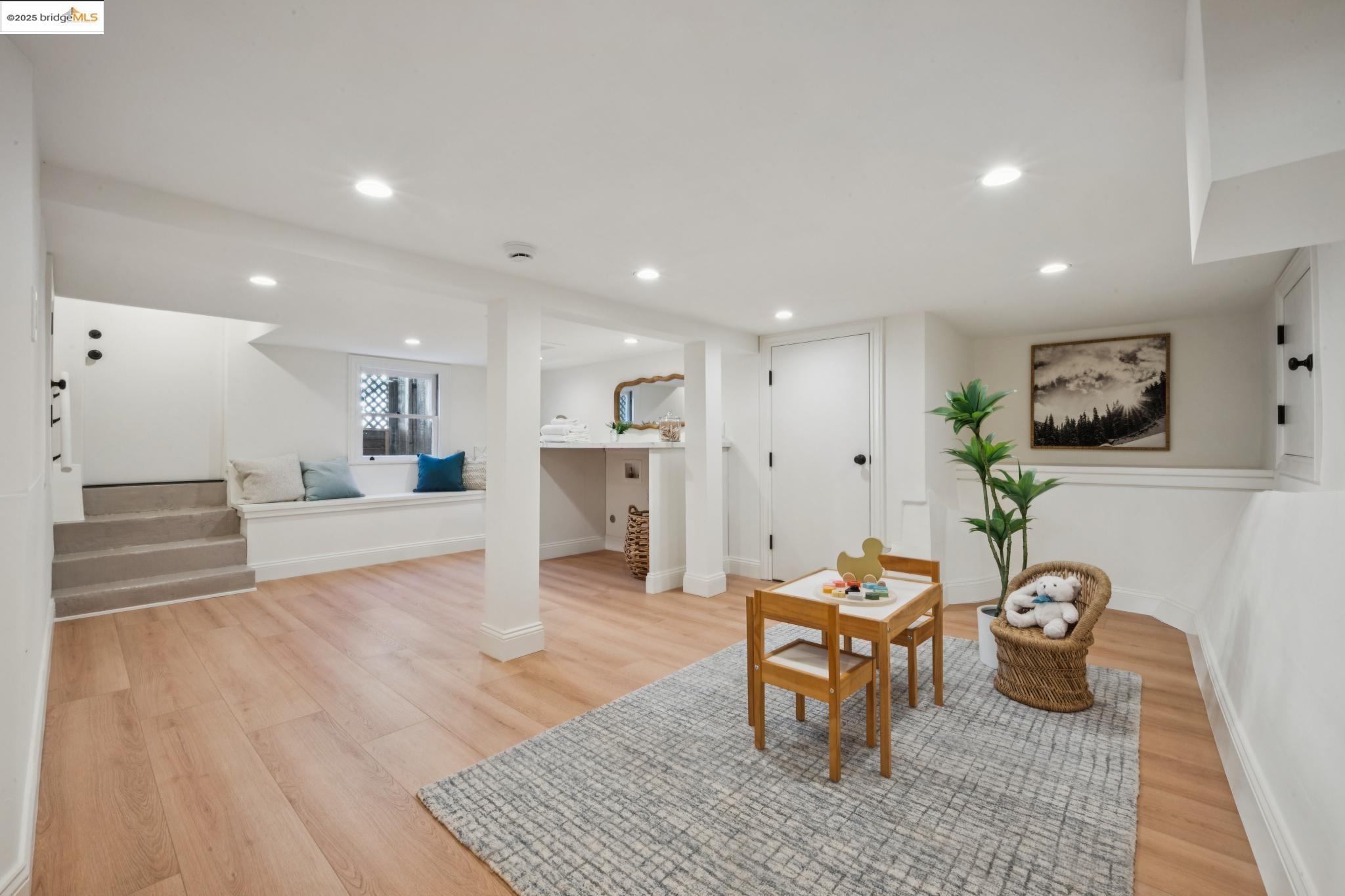 1833 Sonoma Avenue Berkeley, CA 94707 - Photo 36 of 57 a living room with furniture and kitchen view