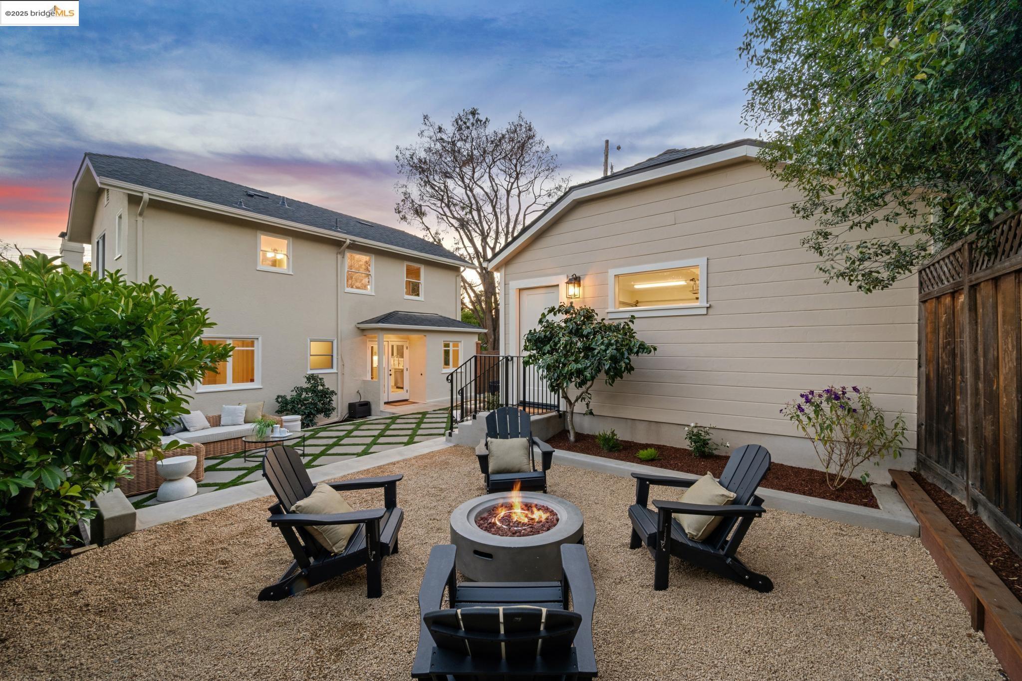 1833 Sonoma Avenue Berkeley, CA 94707 - Photo 56 of 57 a view of a patio with couches table and chairs and potted plants