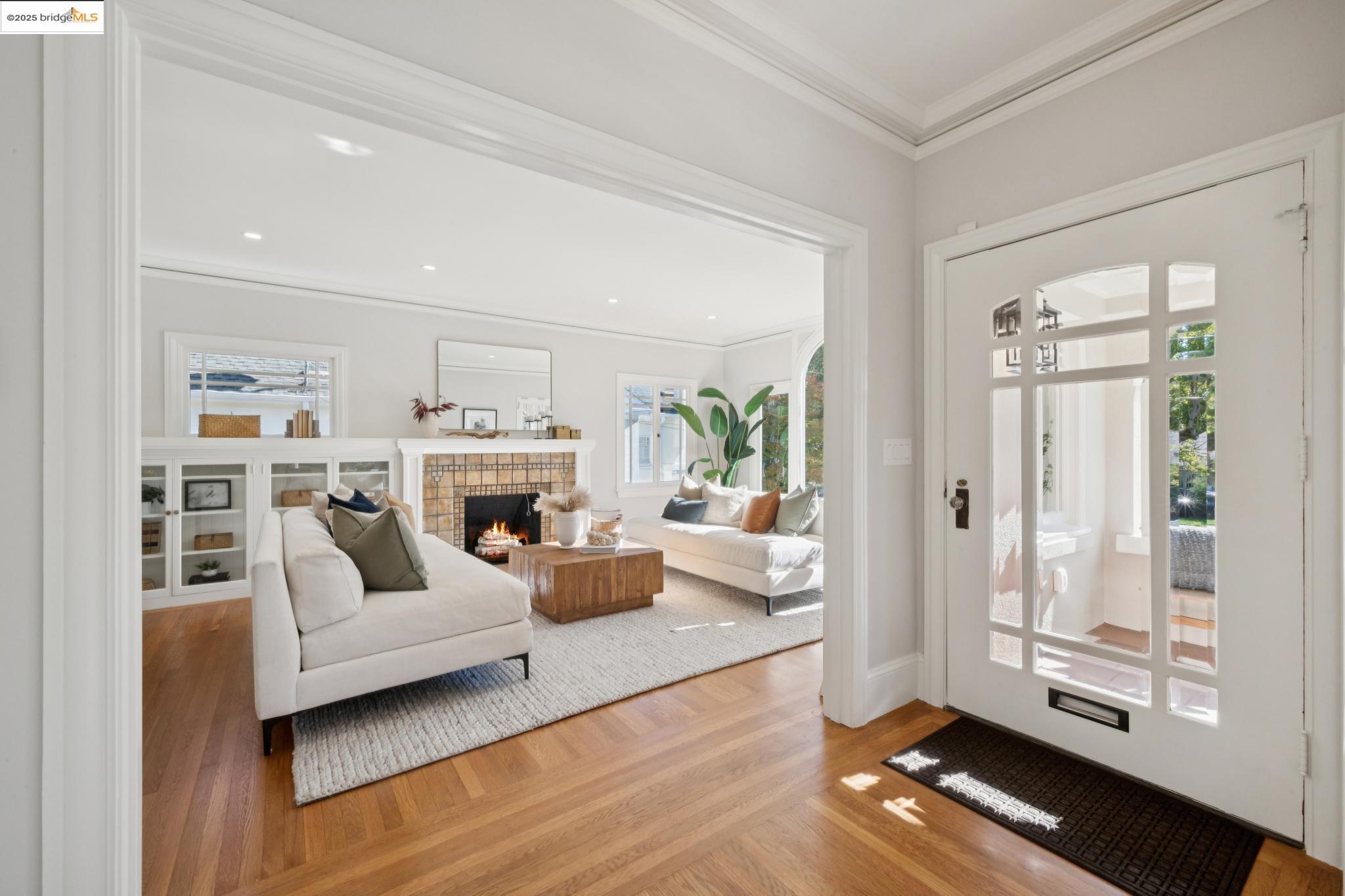 1833 Sonoma Avenue Berkeley, CA 94707 - Photo 8 of 57 a living room with furniture large window and a fireplace