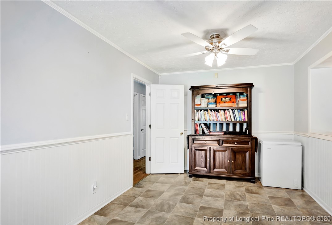 994 East Great Marsh Church Road St. Pauls, NC 28384 - Photo 16 of 30 a view of a kitchen with an empty space and a window