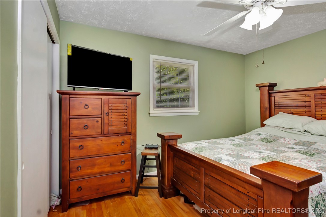 994 East Great Marsh Church Road St. Pauls, NC 28384 - Photo 26 of 30 a living room with furniture and a flat screen tv