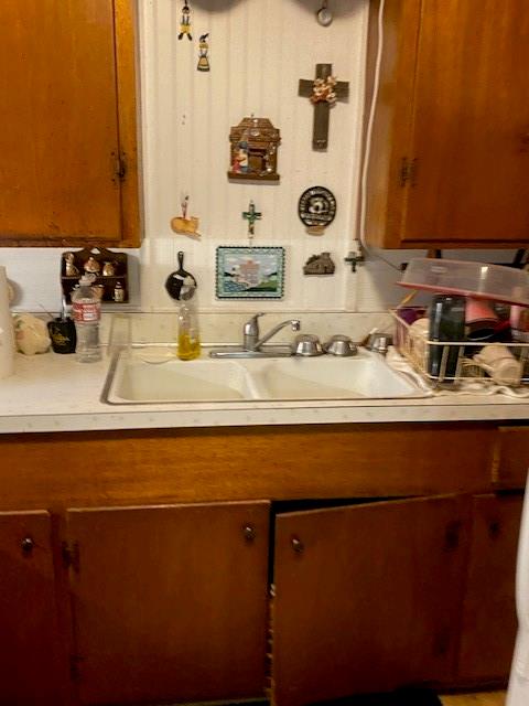 7060 John T White Road Fort Worth, TX 76120 - Photo 6 of 13 a bathroom with a sink and a mirror